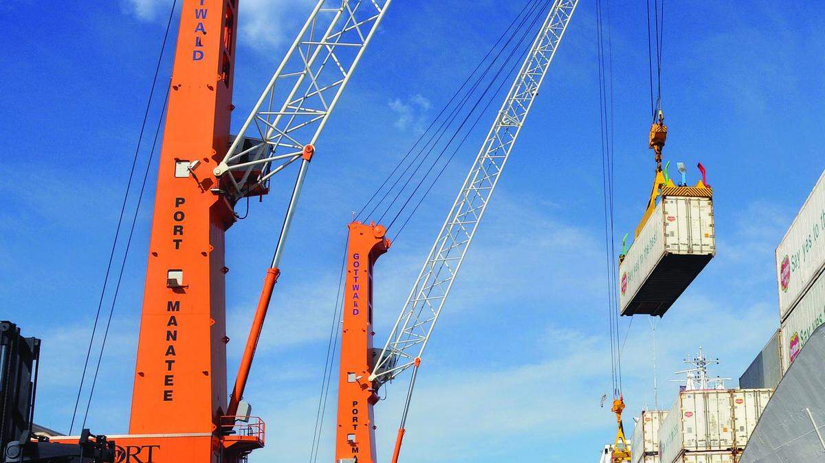 Cranes at Port Manatee load Fresh Del Monte containers on a ship. The port saw an 83-percent increase in container volume in its most recent fiscal year compared to the 12 months previous. PROVIDED PHOTO