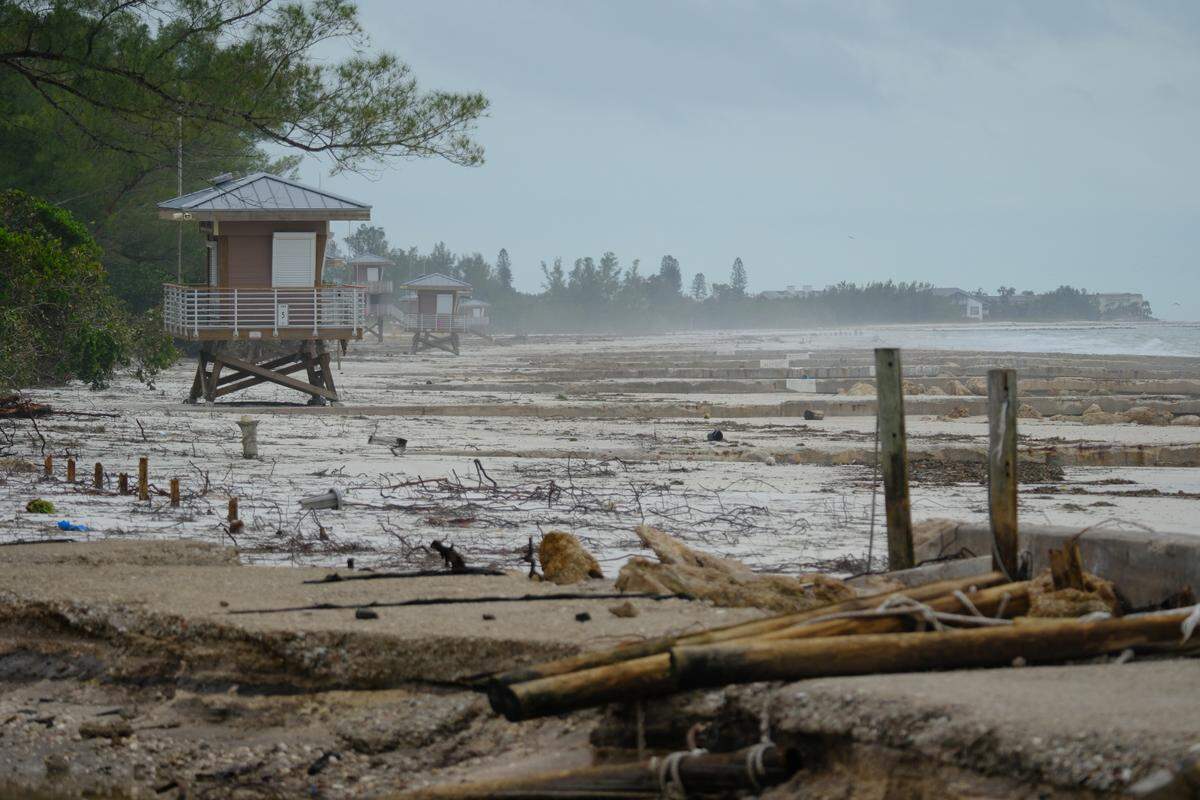 Hurricane Helene’s storm surge flattened sand dunes and damaged lifeguard towers on Anna Maria Island as the powerful Category 4 storm passed Manatee County in the Gulf of Mexico.