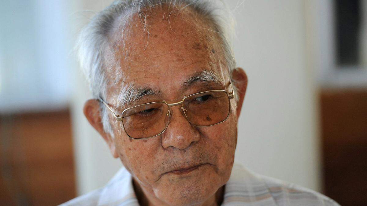 Takeichi Kakinohana, 85, a native of Aka Island, is concerned about Japanese Prime Minister Shinzo Abe's recent lifting of restrictions on Japan's military, which limited their actions for self-defense since the end of WWII. Kakinohana witnessed American military landing on Aka Island during the Battle of Okinawa and where, eventually, the Japanese finally surrendered. (Tiffany Tompkins-Condie/McClatchy DC/TNS)