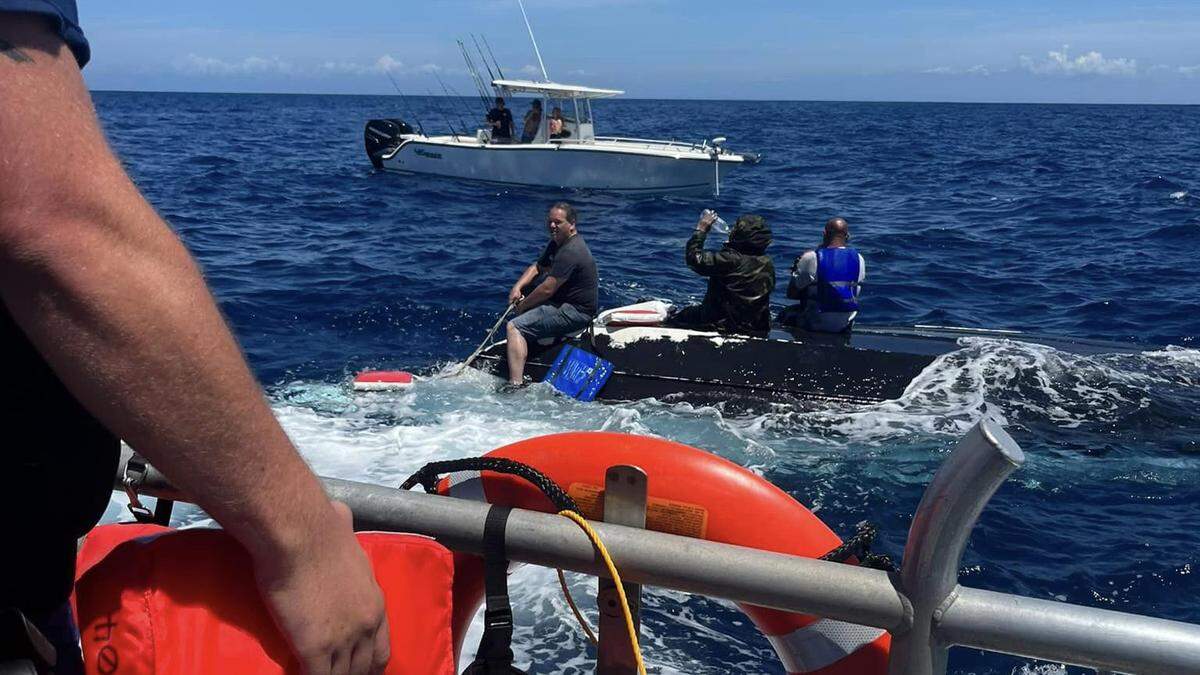 The US Coast Guard rescued local fishermen who were stranded in the Gulf of Mexico after their boat flipped over in the middle of the night.
