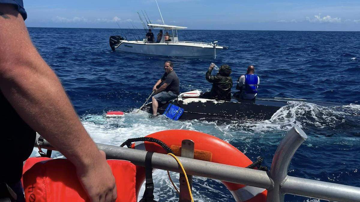 The US Coast Guard rescued local fishermen who were stranded in the Gulf of Mexico after their boat flipped over in the middle of the night.
