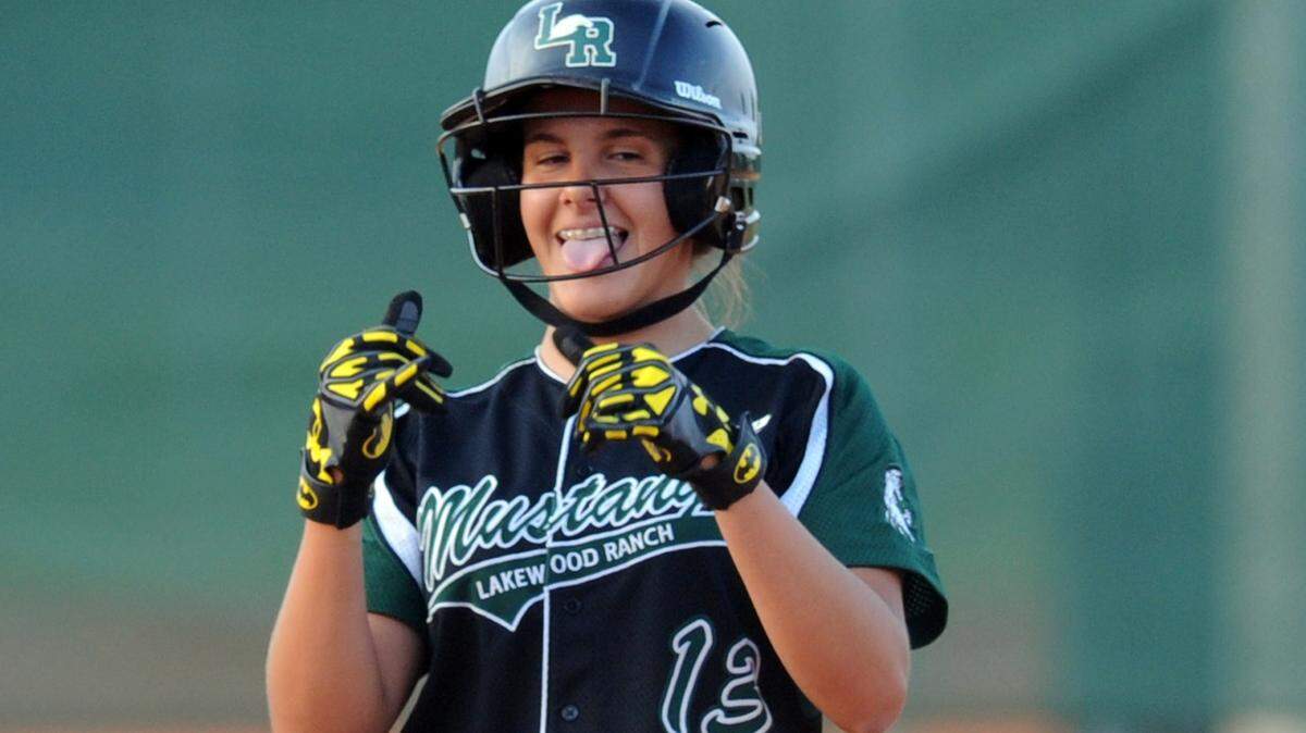 Lakewood Ranch's Kyra Klarkowski smiles after hitting a triple in a Class 8A-District 8 softball semifinal against Manatee High on Tuesday at Lakewood Ranch. 
 GRANT JEFFERIES/Bradenton Herald