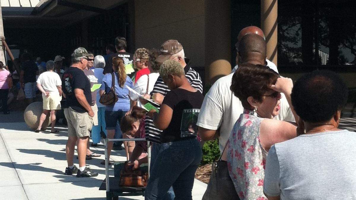 Fruit tree buyers line up early to get first crack at the offerings during the Manatee Rare Fruit Tree Sale at the Bradenton Area Convention Center.