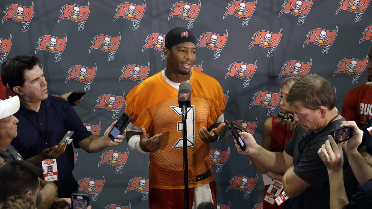 Tampa Bay Buccaneers quarterback Jameis Winston (3) speaks to the media after practice at NFL football training camp, Thursday, July 26, 2018, in Tampa, Fla. Winston is suspended for three games after violating the league’s personal conduct policy.