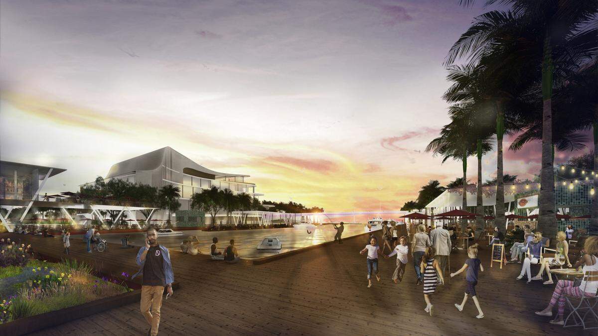 An artist rendering of a new Sarasota Performing Arts Center and community park proposed by the Sarasota Bayfront Planning Organization. The new performing arts center has a tiered design and is visible in the background of the rendering, to the left.