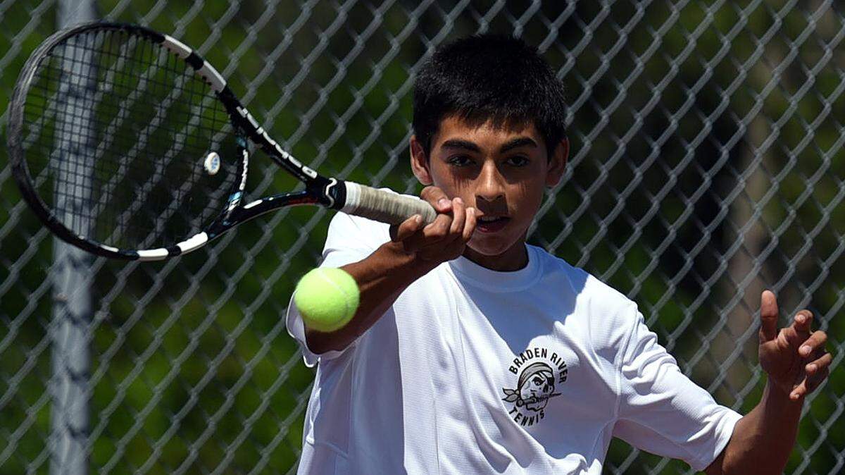 Braden River's David Ojeda plays a match against Tampa Freedom in a tennis regional final at Braden River Thursday. 
 TIFFANY TOMPKINS/Bradenton Herald