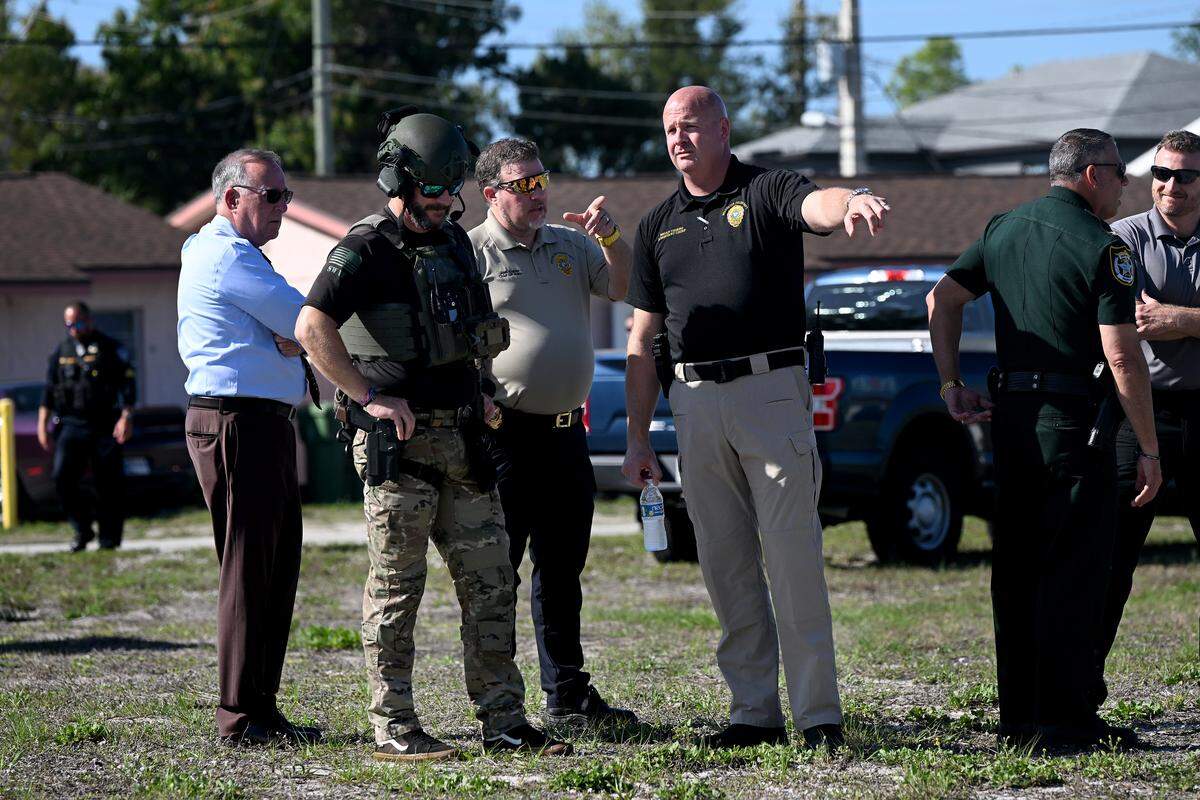 Bradenton Police Chief Josh Cramer, Deputy Chief Brian Thiers and other officials at the scene of a police shooting that happened while serving a narcotics-related warrant at 303 10th Ave. W., Bradenton, on Tuesday, March 10, 2026, the department said. Bradenton Police Department’s SWAT team was attempting to enter the home when they were confronted by an armed person, police say.