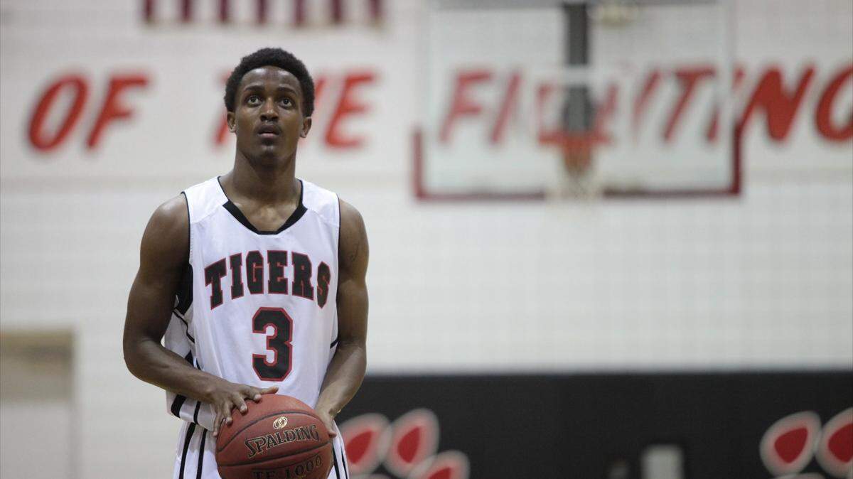 Palmetto High School's Jordan Smith prepares to shoot a free throw during the region championship game Feb. 24, 2012, against Winter Haven at Palmetto.HERALD FILE PHOTO