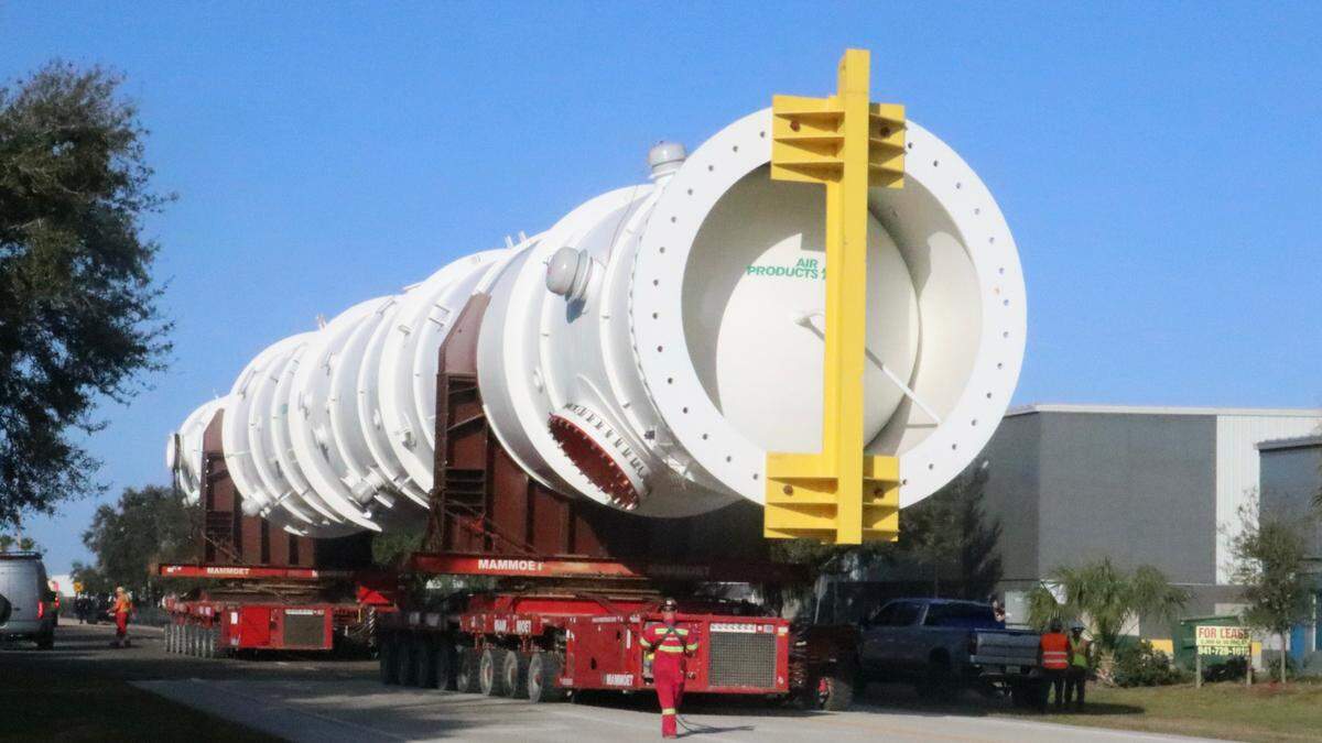 For a few minutes 2/4/2022, the Florida Highway Patrol blocked traffic in both directions on the four-lane U.S. 41 north of Palmetto as a 173-foot exchanger moved at walking speed toward the waiting barge at Port Manatee.&nbsp;
