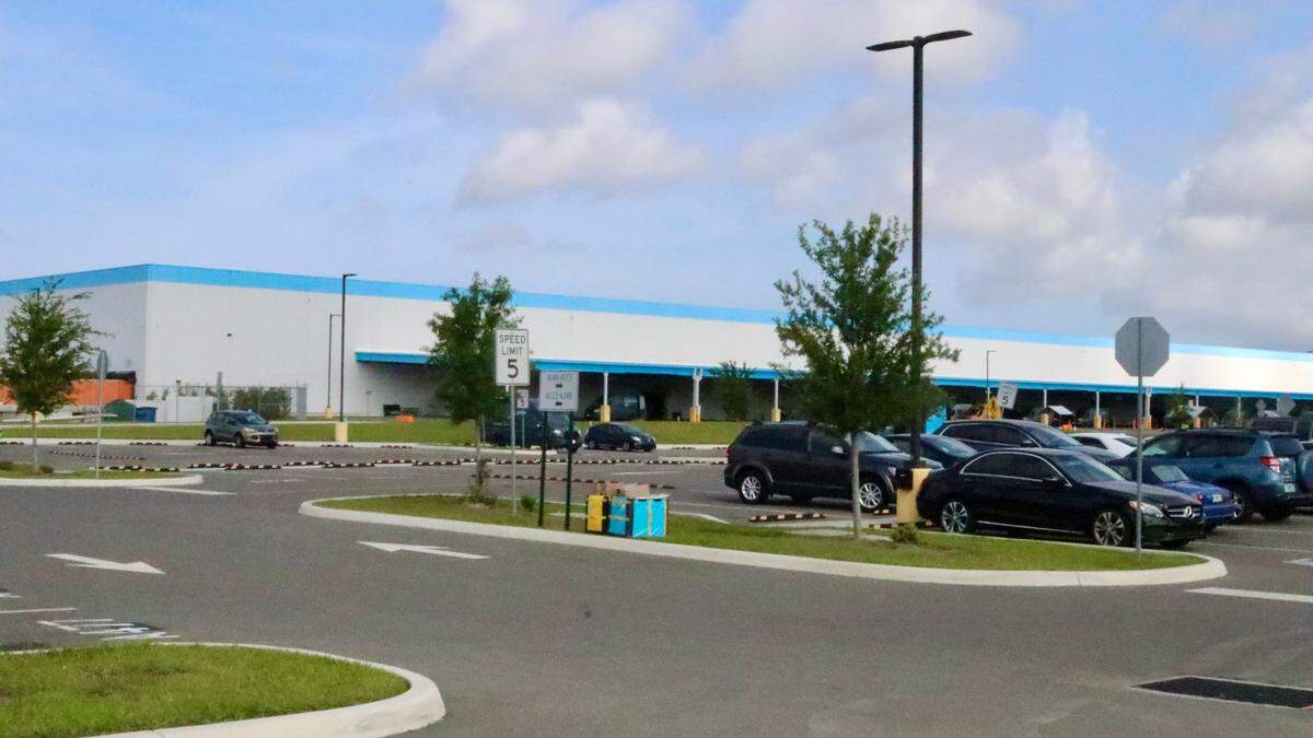 Manatee County Development Services is fast tracking permitting requests for a 355-unit apartment complex on acreage south of the Amazon distribution center, shown above and west of U.S. 301.