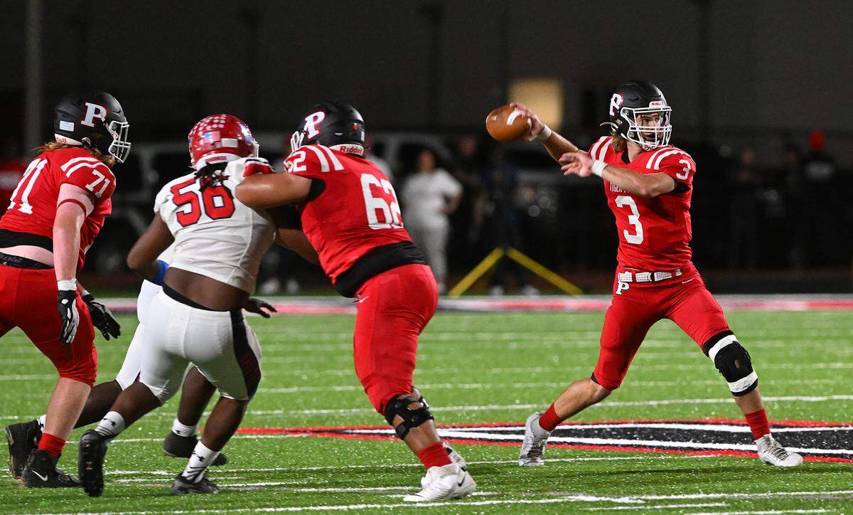 Palmetto’s Clayton Dees prepares to throw a pass against Manatee on Friday, Oct. 27, 2023 in Palmetto.