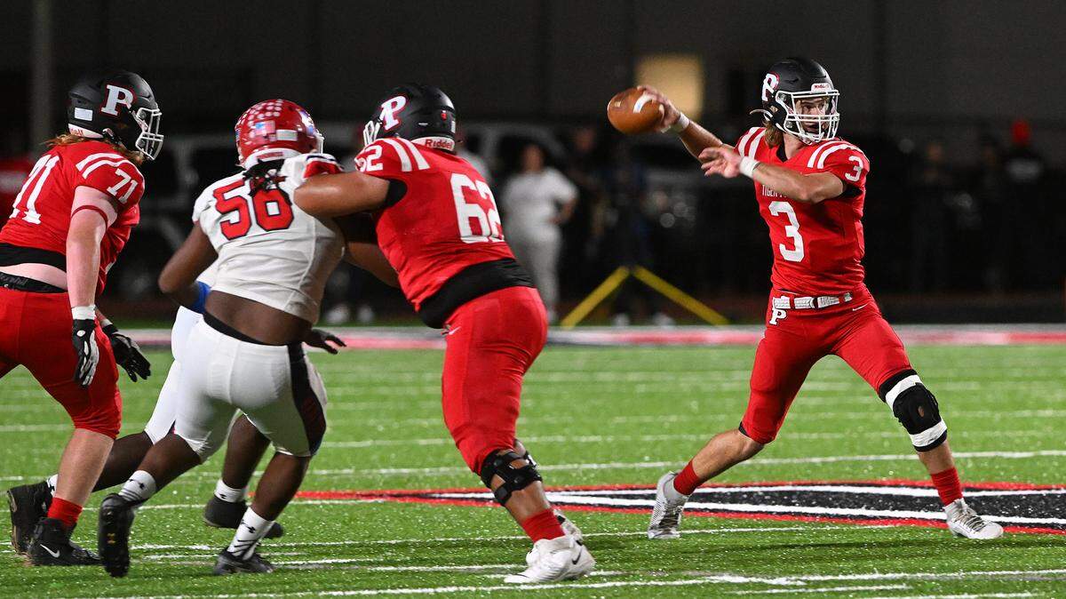 Palmetto’s Clayton Dees prepares to throw a pass against Manatee on Friday, Oct. 27, 2023 in Palmetto.