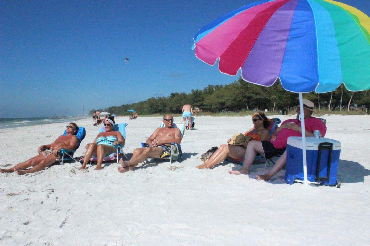 Malcolm and Glynis Ashworth, and Michael, Lesley and John Goodwin, all from England, were warming up on Anna Maria Island in 2015.
