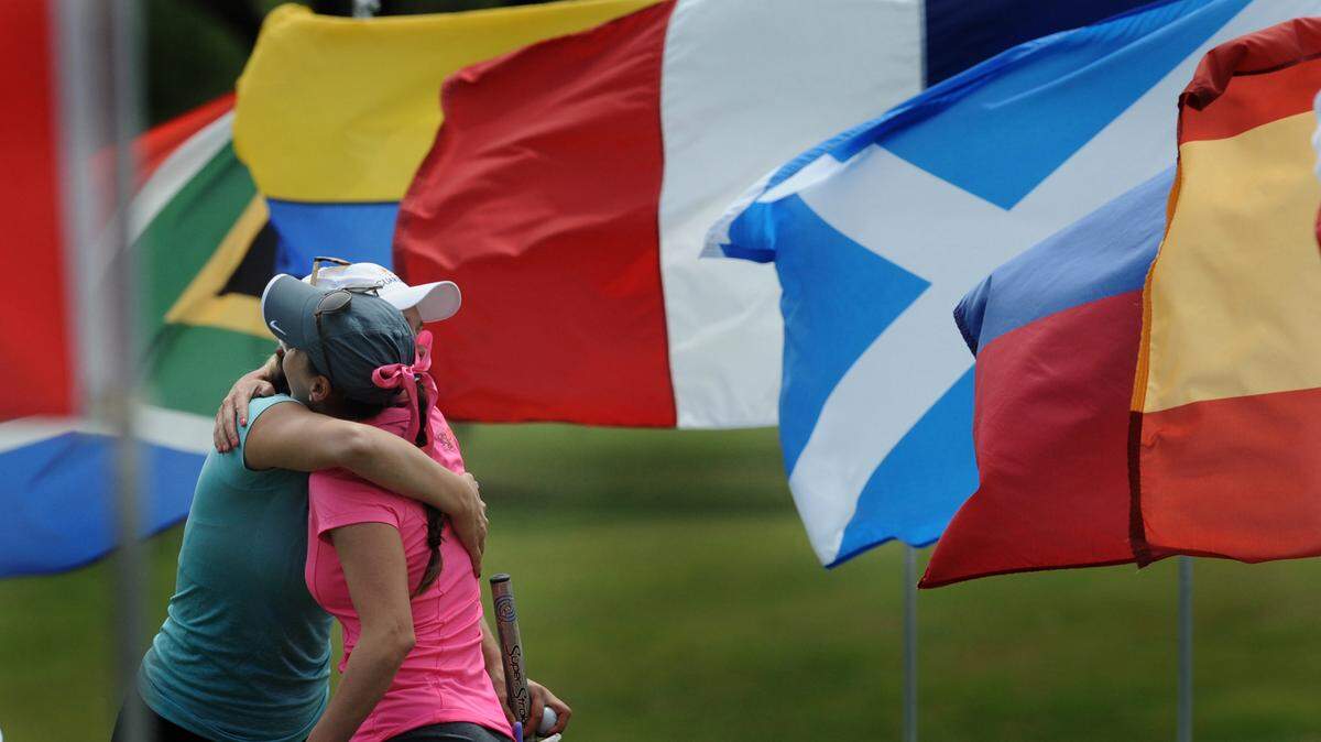 Emily Talley of Napa, Calif., greets Margarita Ramos of Mexico City, Mexico, as they prepare to play in the first round of the 2016 LPGA Symetra Tour Guardian Retirement Championship on Friday at Sara Bay County Club. 
 GRANT JEFFERIES/Bradenton Herald