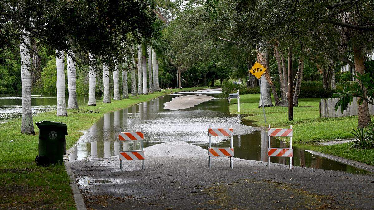 Virginia Drive experiences flooding from Ware’s Creek as Hurricane Helene approaches Manatee County on Thursday, Sept. 26, 2024.