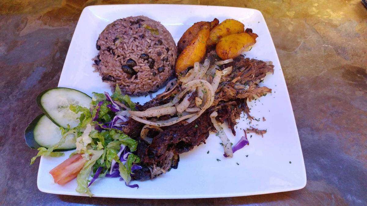 Vaca Frita (shredded beef sauteed with garlic and onions) is one of the most popular entrees served by Mirna's Cuban Cuisine.