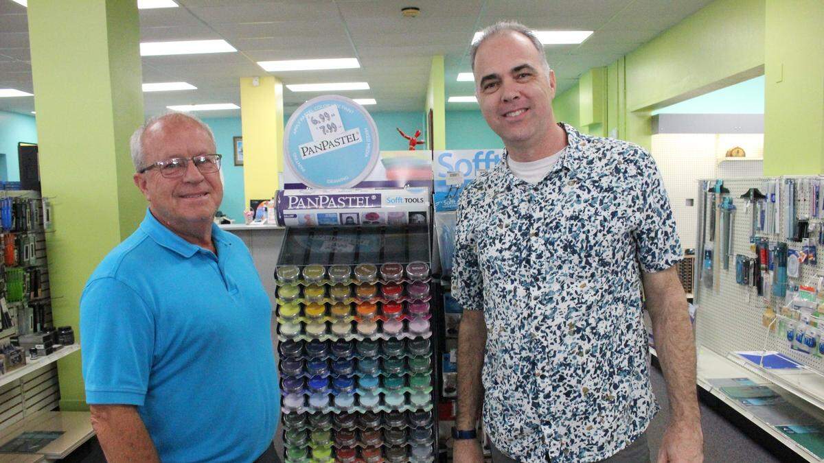 Brice Hoopingarner, left, and his wife Tricia have sold the office supply and office furniture divisions of Keeton’s Office Supply to Apex of Tampa. The art supply side of the business, renamed Creative Art Supply, remains in local hands. Retail sales manager Frank Perry is shown at right.