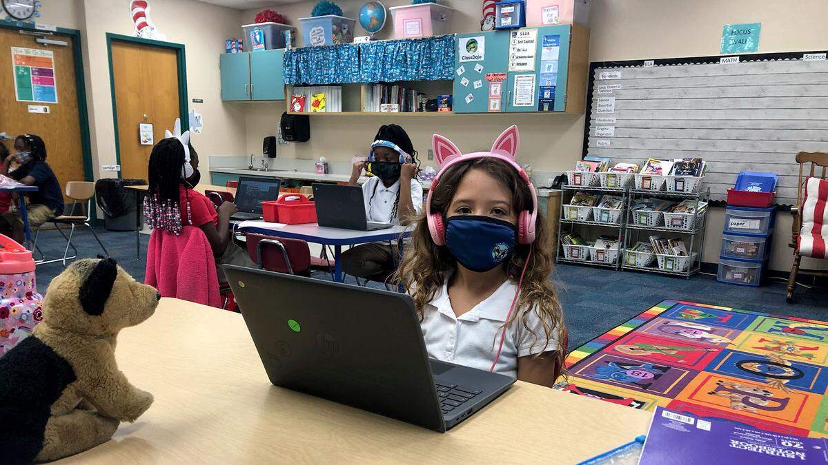 Aubrey Romero, 7, was diagnosed with a rare form of cancer. Her teacher and classmates at Sea Breeze Elementary School have rallied to raise money for her treatment and raise her spirits.
