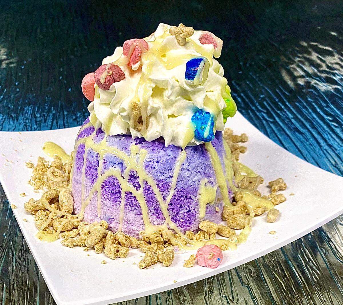 Charming Taro (taro snow topped with whipped cream, Lucky Charms and sweetened condensed milk), is one of the Vampire Penguin offerings at Uncle Nick’s New York Bagels, 5917 Manatee Ave. W., Bradenton.