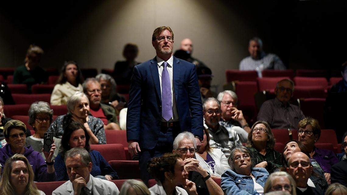 Dr. Bryan Ardis stands when introduced by a citizen speaker Monday where dozens of “medical freedom” activists attended a public board meeting at Sarasota Memorial Hospital, criticizing the hospital’s response to the COVID-19 pandemic and suggested alternative methods.