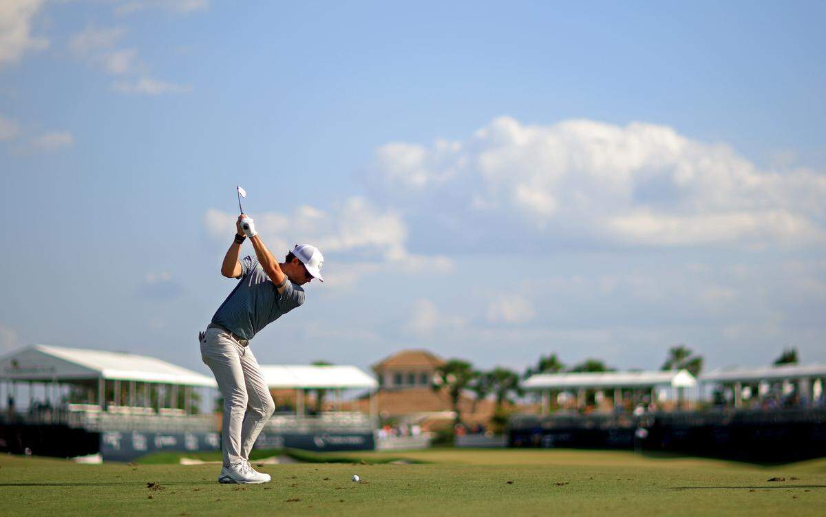 Michael Johnson hits his approach shot on the 18th hole during the third round of the LECOM Suncoast Classic at Lakewood National Golf Club on April 18, 2025, in Lakewood Ranch, Florida.