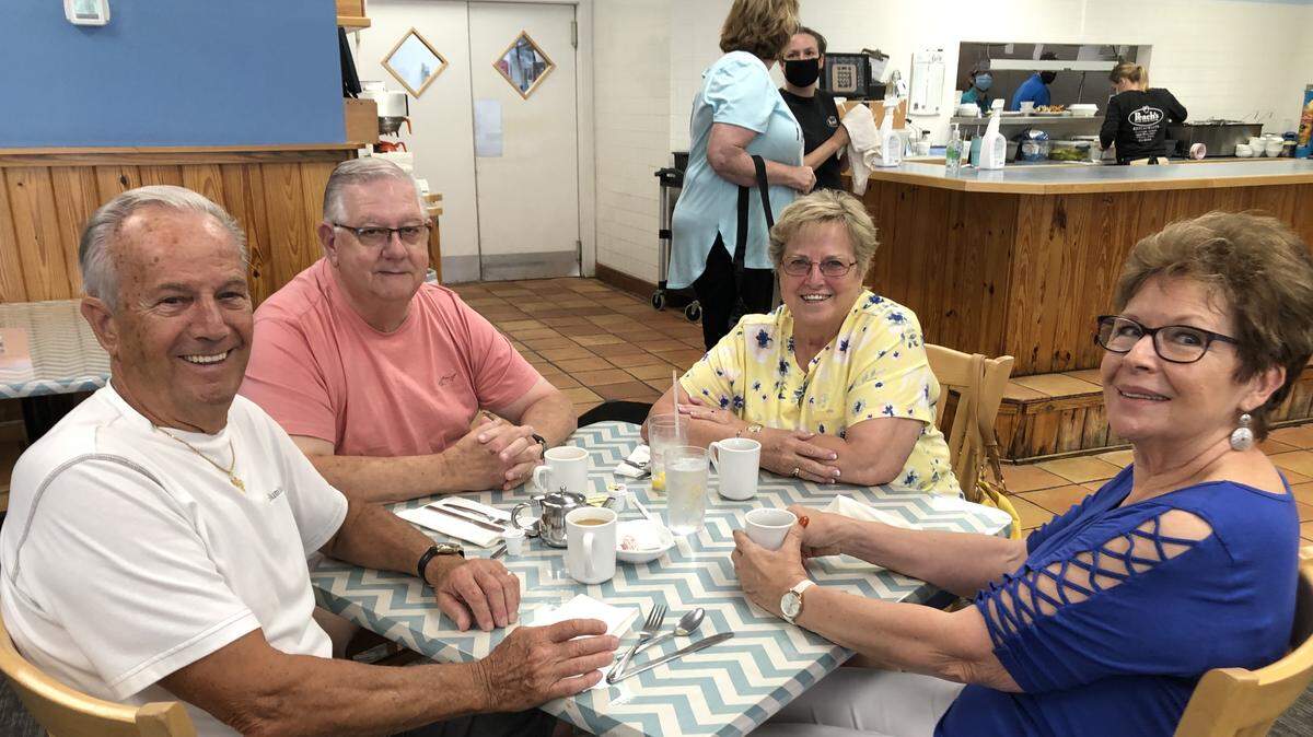 Les Layton, Bill Schlitzer, Linda Schlitzer, and Bonita Layton, from left, drove down from Parrish for their first meal in weeks from the Ellenton Peach’s Restaurant at 2207 60th Ave. E. The restaurant reopened this week after being closed for the COVID-19 pandemic.