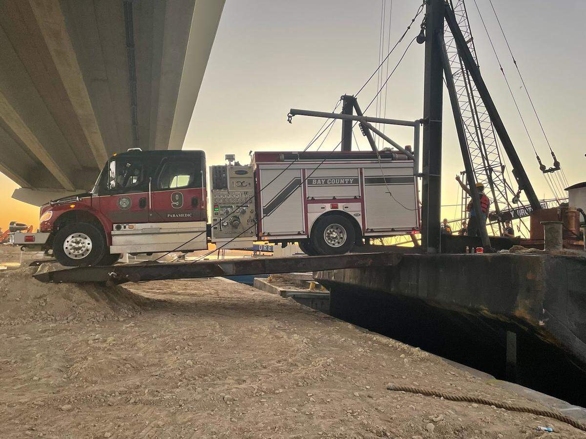 Bay County Engine 9 is being loaded on a barge to go with the engine strike team to Sanibel Island.