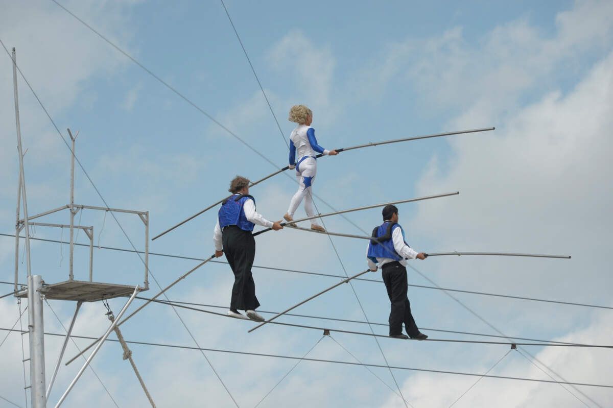 The Wallendas perform their high wire act during the Mixon Fruit Farms Orange Blossom Festival in this file photo.