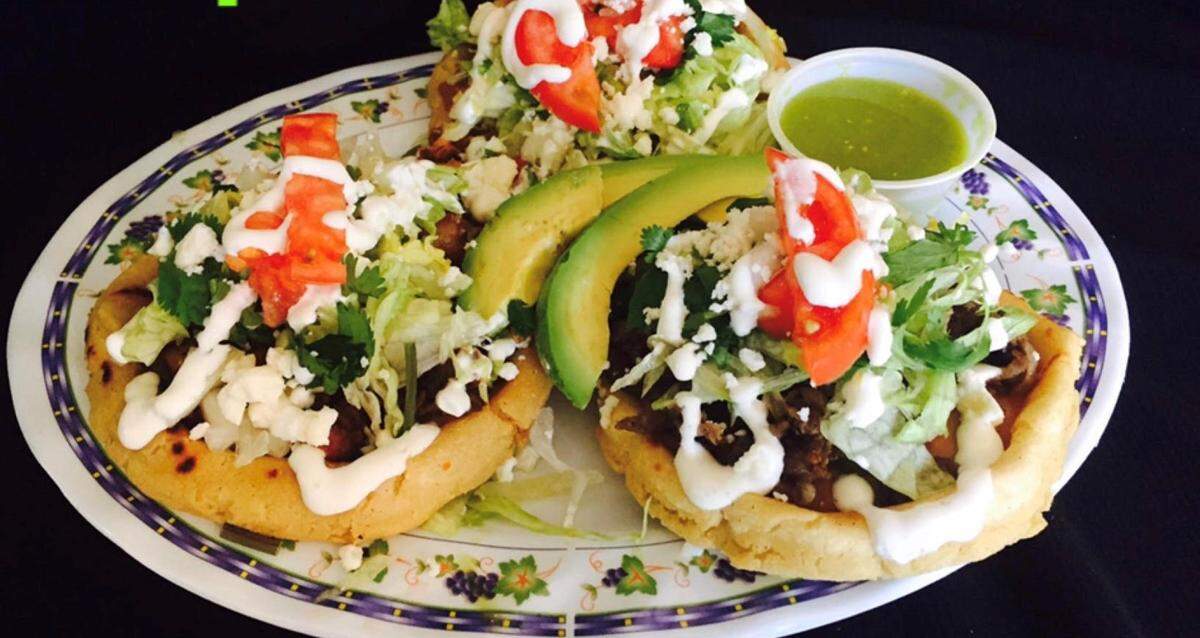 Sopes, a thick tortilla with vegetables and meat toppings, is one of the new menu offerings at Laura Betancourt’s The Spot restaurant.