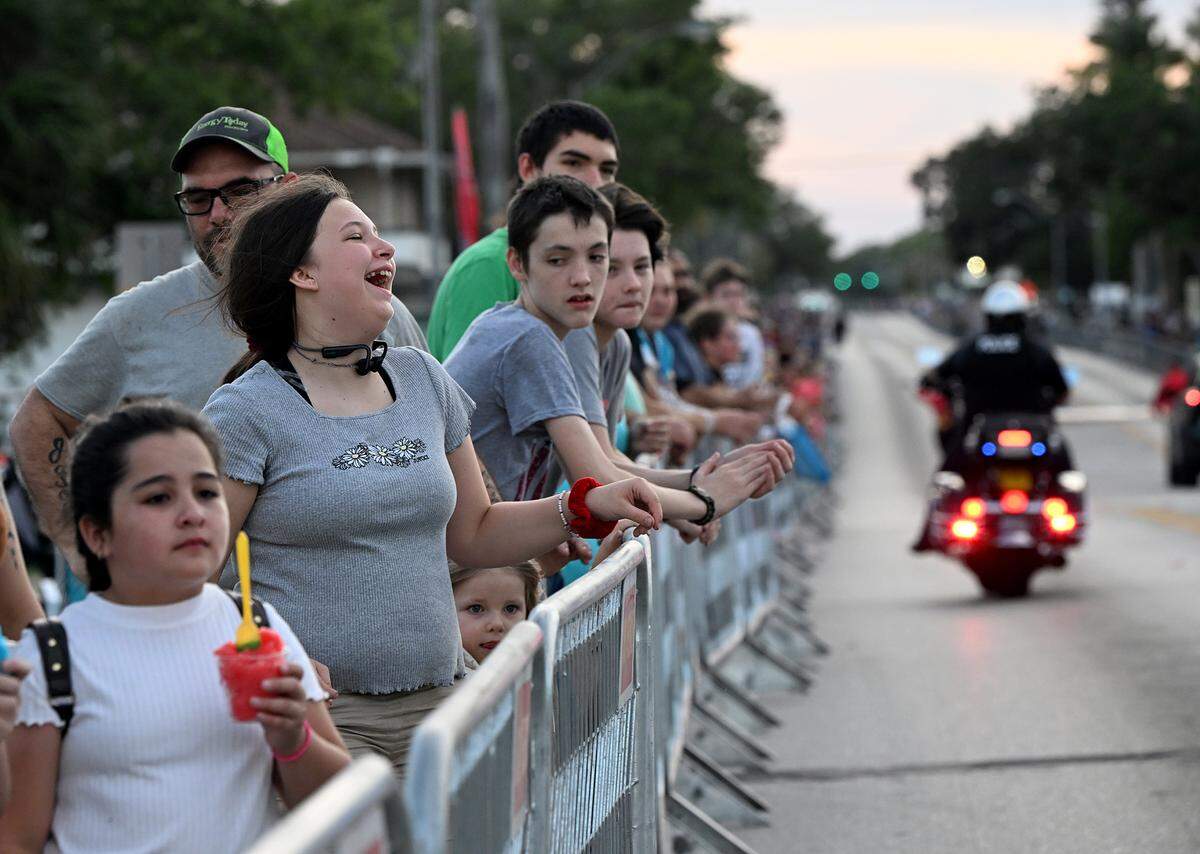 The crowd enjoys the floats during the DeSoto Parade on Saturday, April 27, 2024.