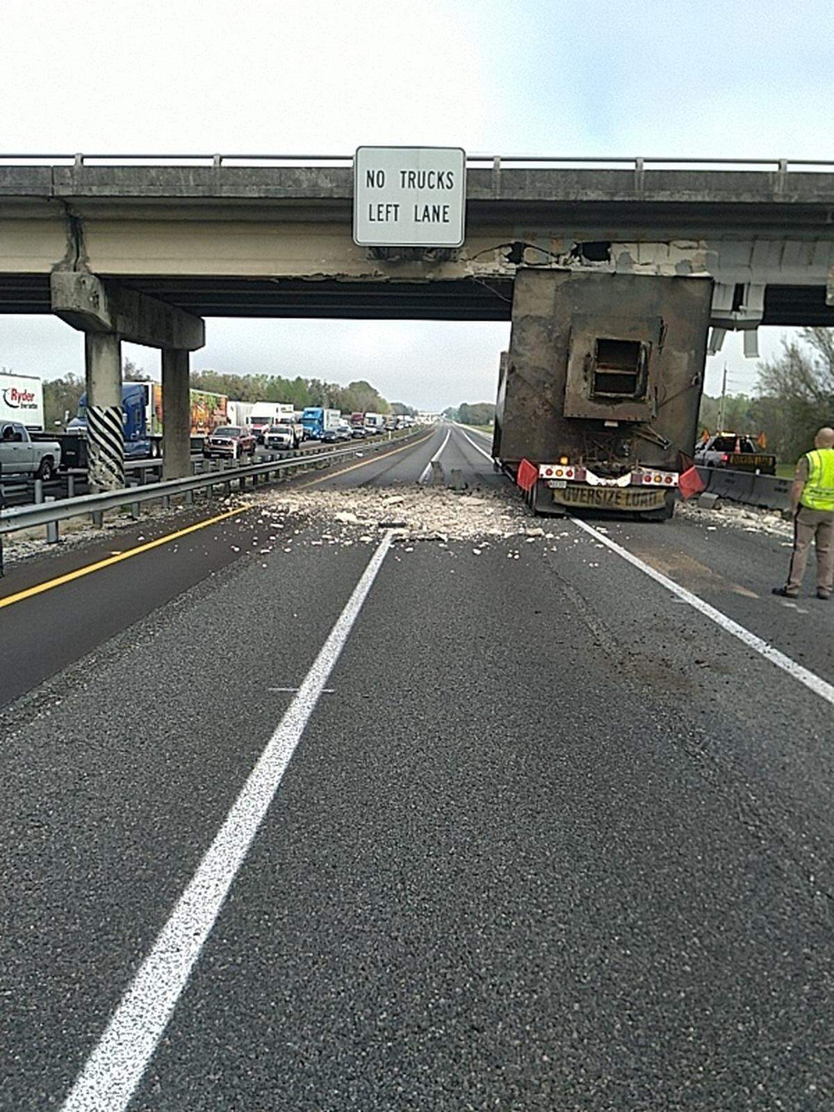 A tractor trailer carrying an oversized load ran into an overpass in Marion County near Ocala on Wednesday, Feb. 22, 2023.