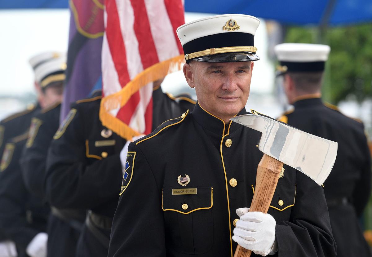 Members of the Manatee County Emergency Services color guard at the Tribute to Heroes Memorial Service at Bradenton’s Riverwalk Tuesday morning.