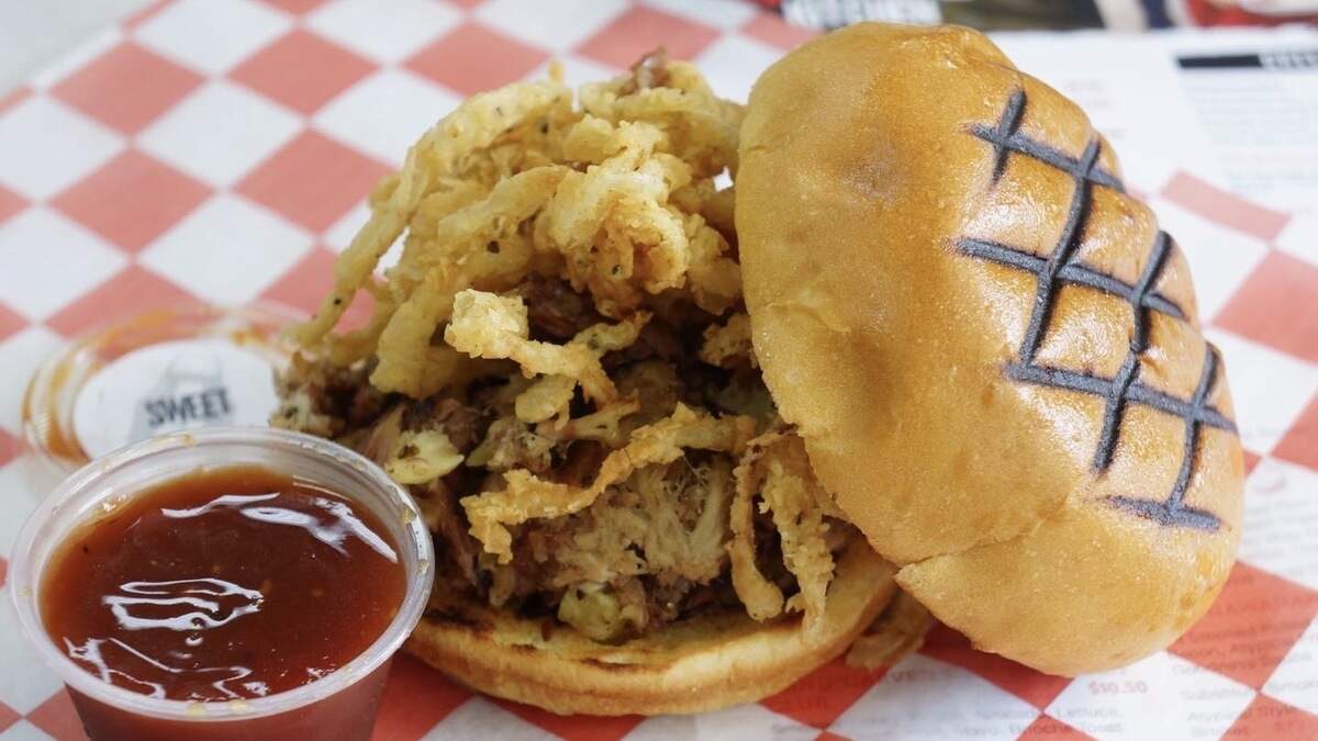 The Hawaiian is loaded with pit smoked pulled pork, grilled pineapple, bacon, and fried onions from Atypical Kitchen, 2539 Lakewood Ranch Blvd. The restaurant specializes in delivery and takeout and has no dining room or seating.