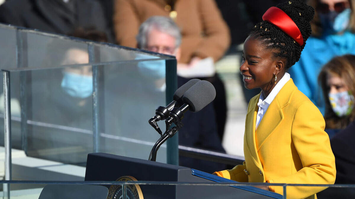 Jan 20, 2021; Washington, DC, USA; Poet Amanda Gorman during the 2021 Presidential Inauguration of President Joe Biden and Vice President Kamala Harris at the U.S. Capitol. Mandatory Credit: Robert Deutsch-USA TODAY
