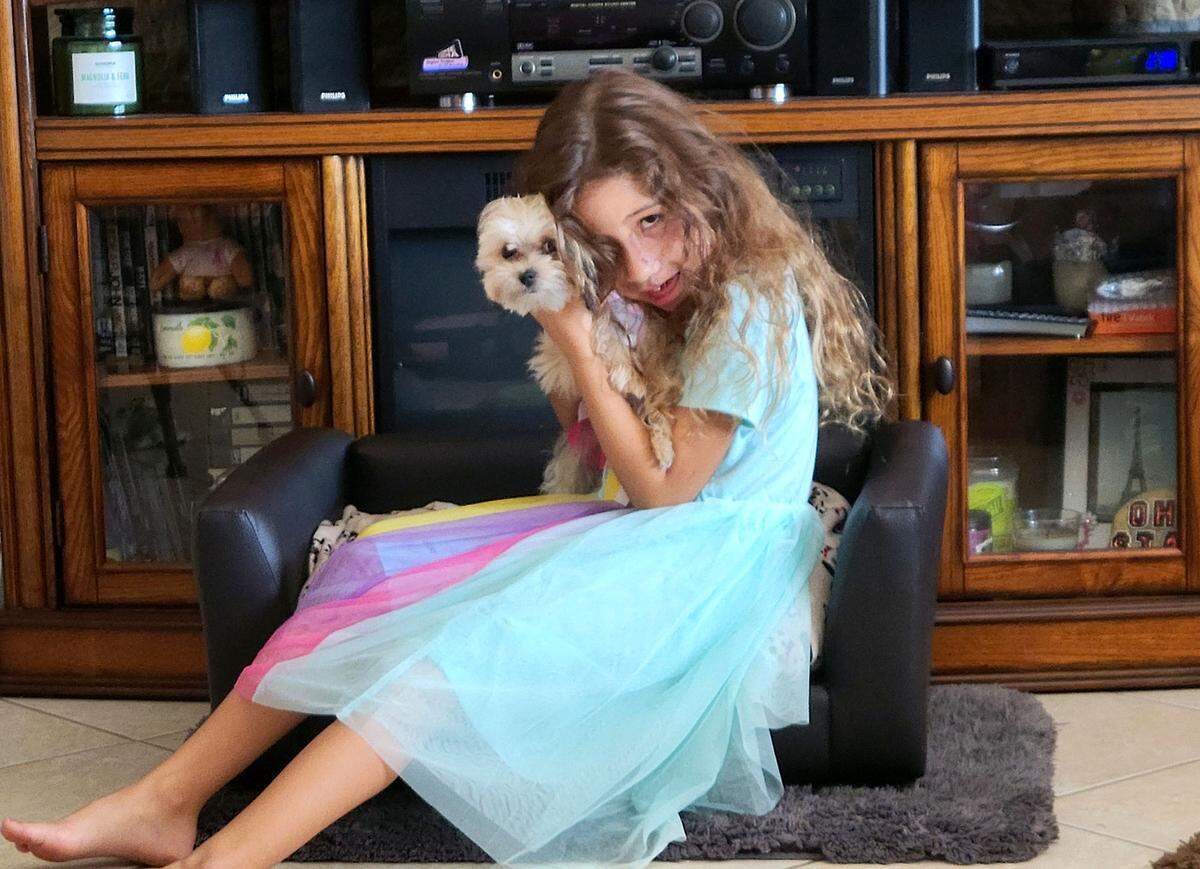 Aubrey Romero, 7, was diagnosed with a rare form of cancer. Her teacher and classmates at Sea Breeze Elementary School have rallied to raise money for her treatment and raise her spirits.