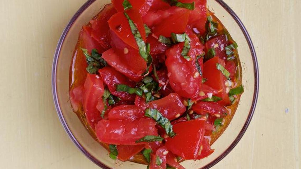 Garlicky marinated tomatoes with two variations.