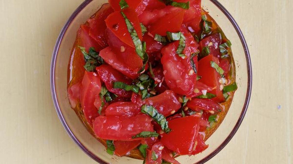 Garlicky marinated tomatoes with two variations.