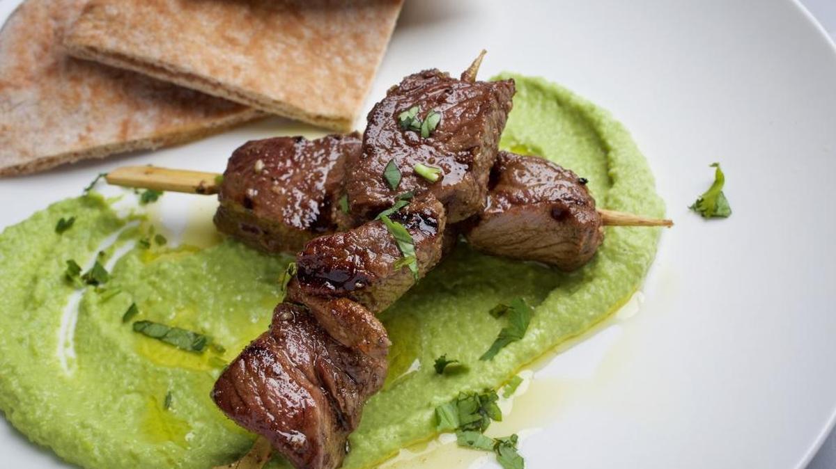 Pea hummus with grilled marinated lamb.