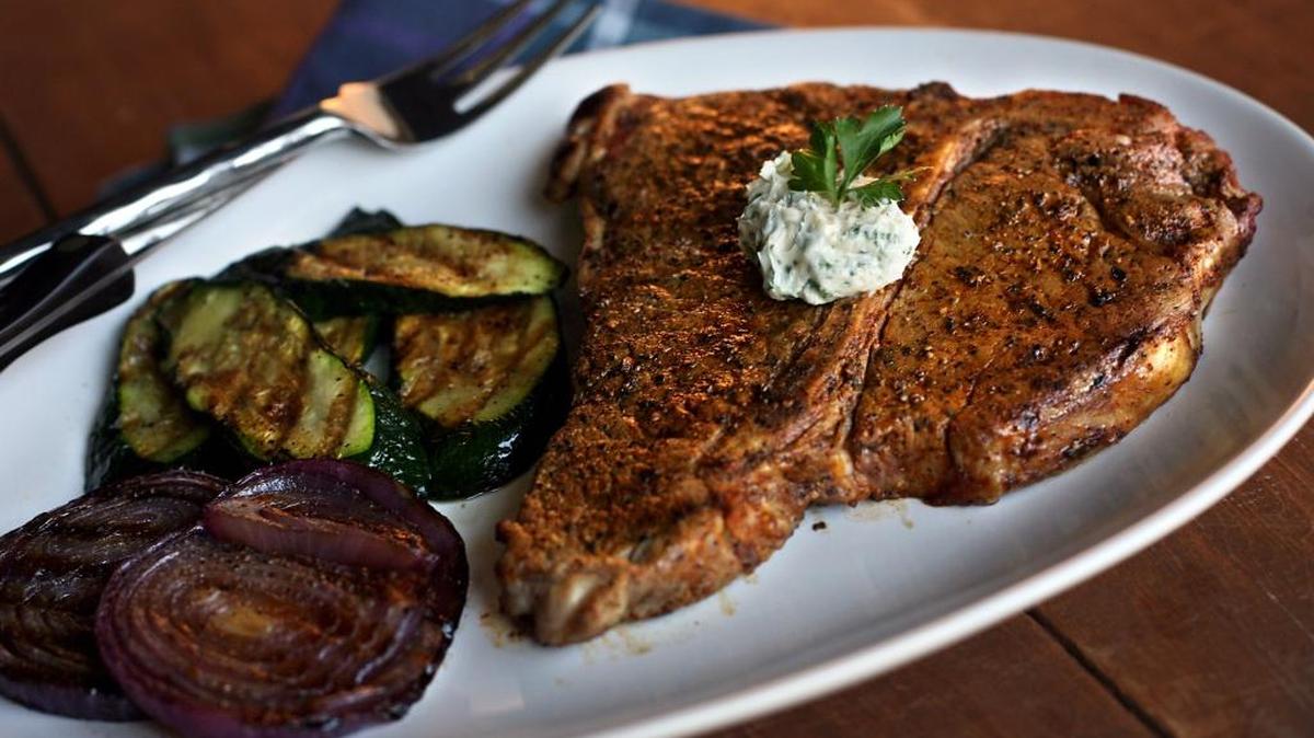 Santa Fe Grilled Porterhouse with grilled zucchini and red onions.