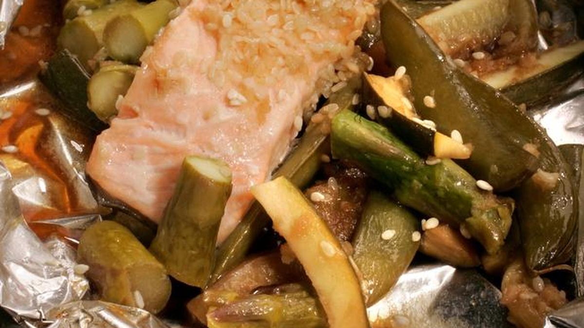 Foil packets are a low-fat way to cook a satisfying meal of fish and vegetables.