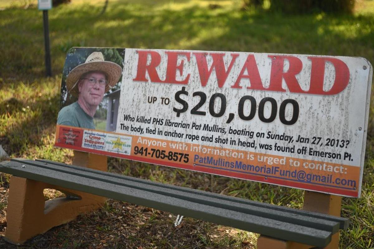 A closeup of the bench facing oncoming traffic on Sixth Avenue West pleading for information about Pat Mullins’ death.