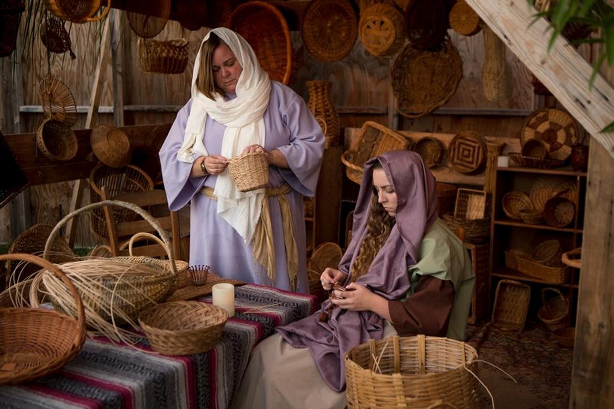 Reenactors portray basket weavers at a past Walk Through Bethlehem event at Samoset First Baptist Church in Bradenton.