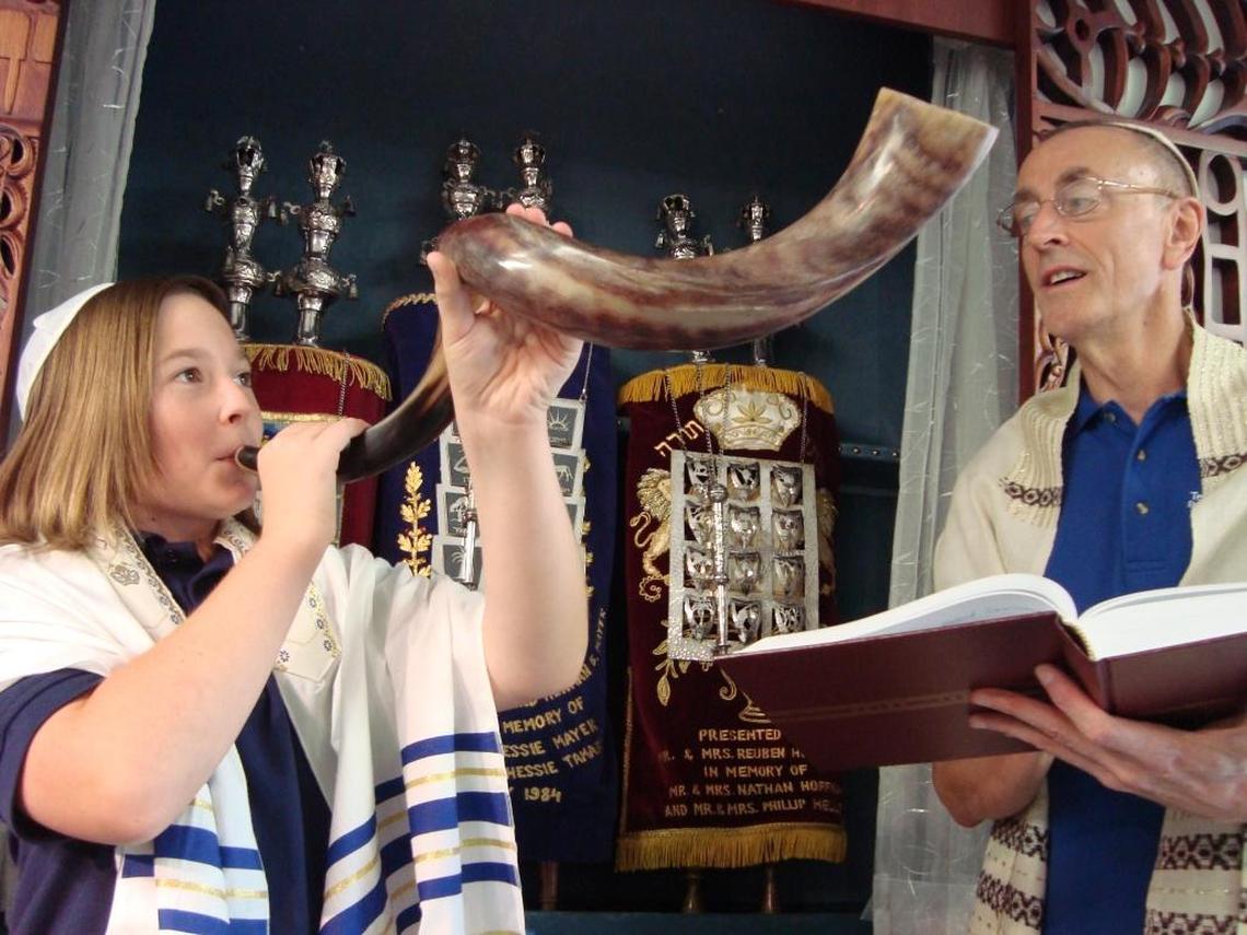A Temple Beth El student sounds the shofar, or Ram’s Horn, in preparation for a past Jewish High Holiday service.