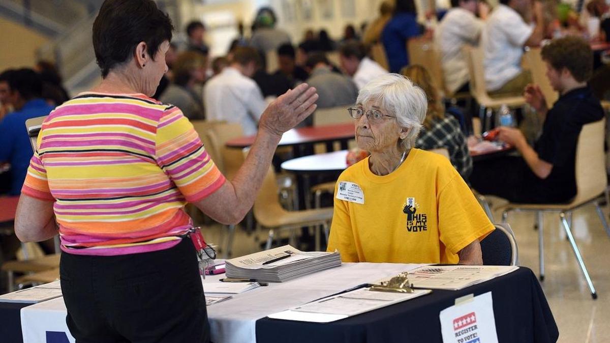 The Manatee Unitarian Universalist Fellowship operates on the UU faith’s seven principles centered around justice, respect, encouraging members to find truth and be active in America’s democratic process. As a part of that, Bernita Franzel, a member of the MUUF congregation sits at a table at Manatee Technical College to encourage students and staff to register to vote.