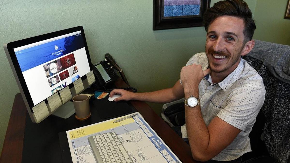 Zac Sopak, creative director for Church on the Rock, uses social media and the church’s website to grow the congregation and audience. The full-time position is a new one for the church and him, he just started this month. Already they are live streaming services, recording podcasts of the sermons and expanding their social media following. Here he shows the church's website.