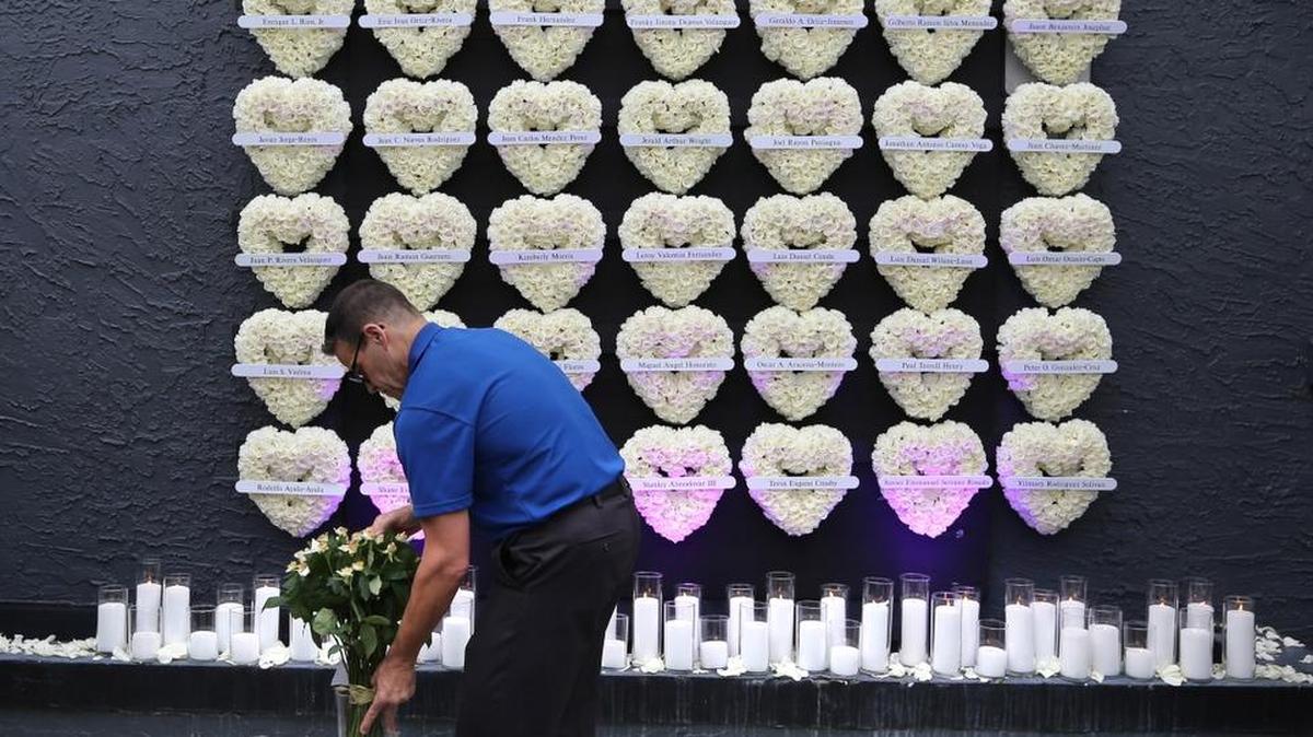 A wall of flowered hearts represents each of the 49 victims killed in the June 12, 2016, massacre at the Pulse nightclub in Orlando