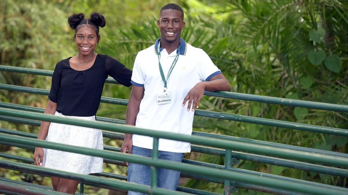 LeNae Jones, 16, and brother Lothario Jr., 17, on a bridge that connects the academic buildings to the athletic area program at Saint Stephen's Episcopal School.