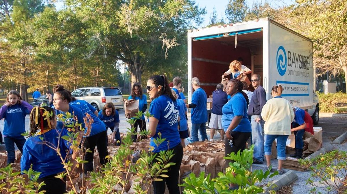 On Sept. 2, volunteers from Bayside Community Church helped residents of the Centre Lake subdivision in Sarasota remove items from their homes that were damaged from floods.