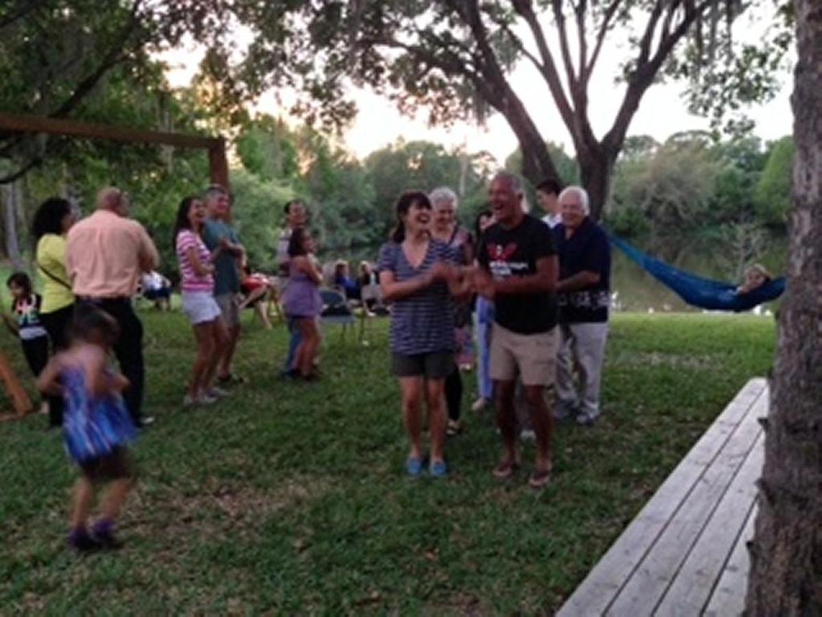 Baha’is and friends celebrate Naw Ruz (NewYear) by being taught a Lakota dance by Kevin Locke, a visiting Lakota and Baha’i, in 2015.