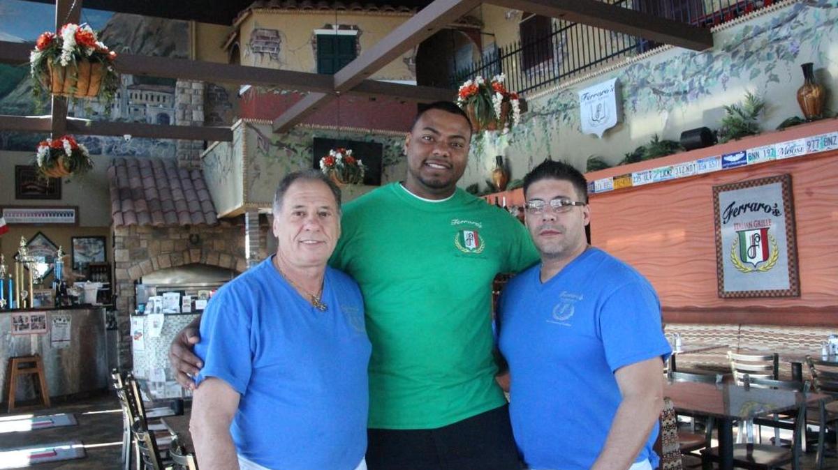 Frank LoGrande, left, is shown with chef Jason Santana and Salvatore LoGrande at Ferraro’s Italian Grille in Parrish.